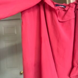 Vibrant Pink Sheer Blouse with straps on the shoulders and ruffle around top.